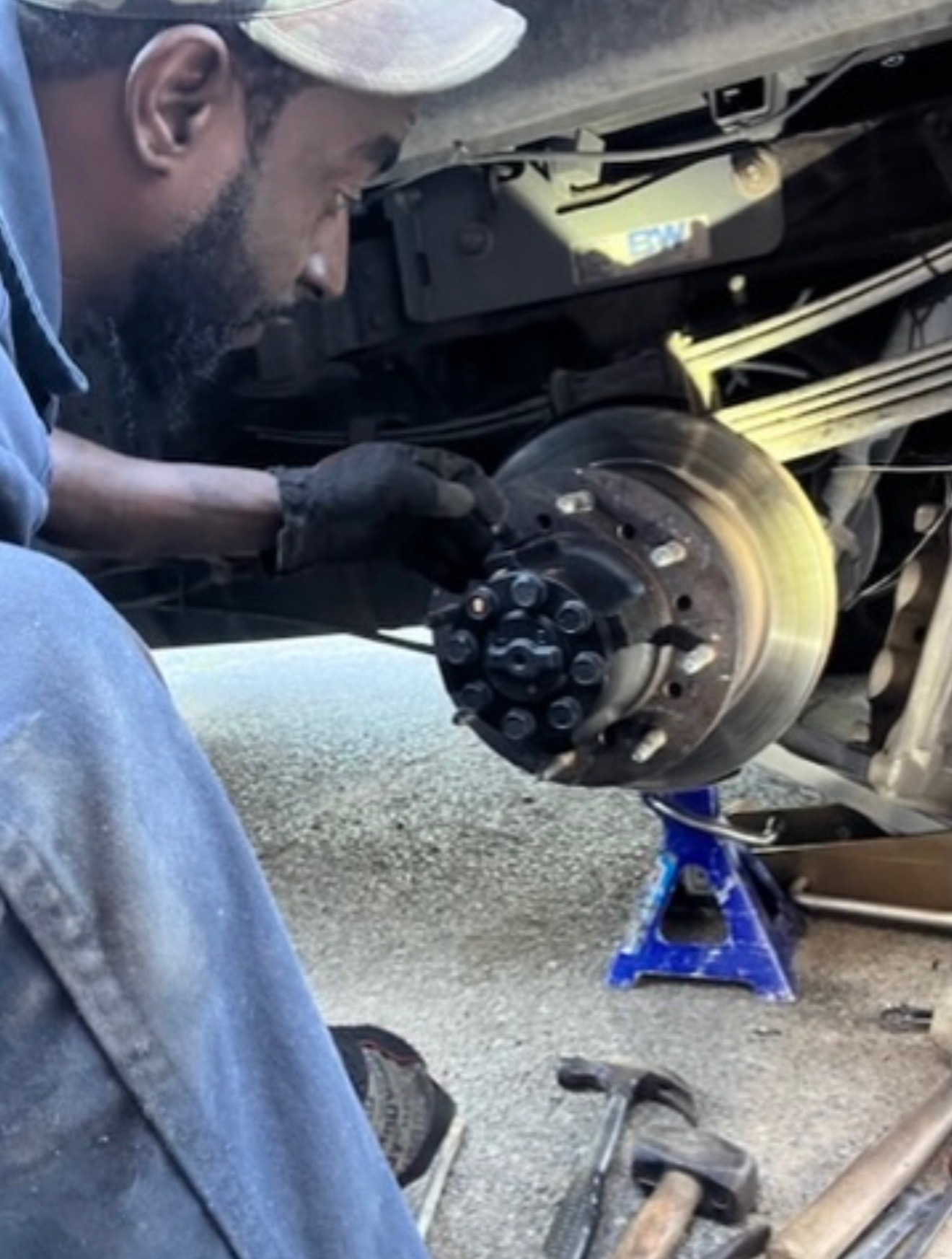 Inspecting rear brake rotor and hub on a dually truck